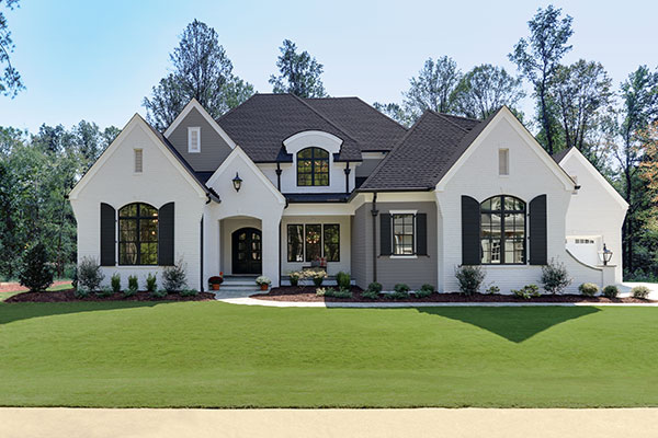 House with Lowe's RELIABILT Series 150 Black Exterior Windows